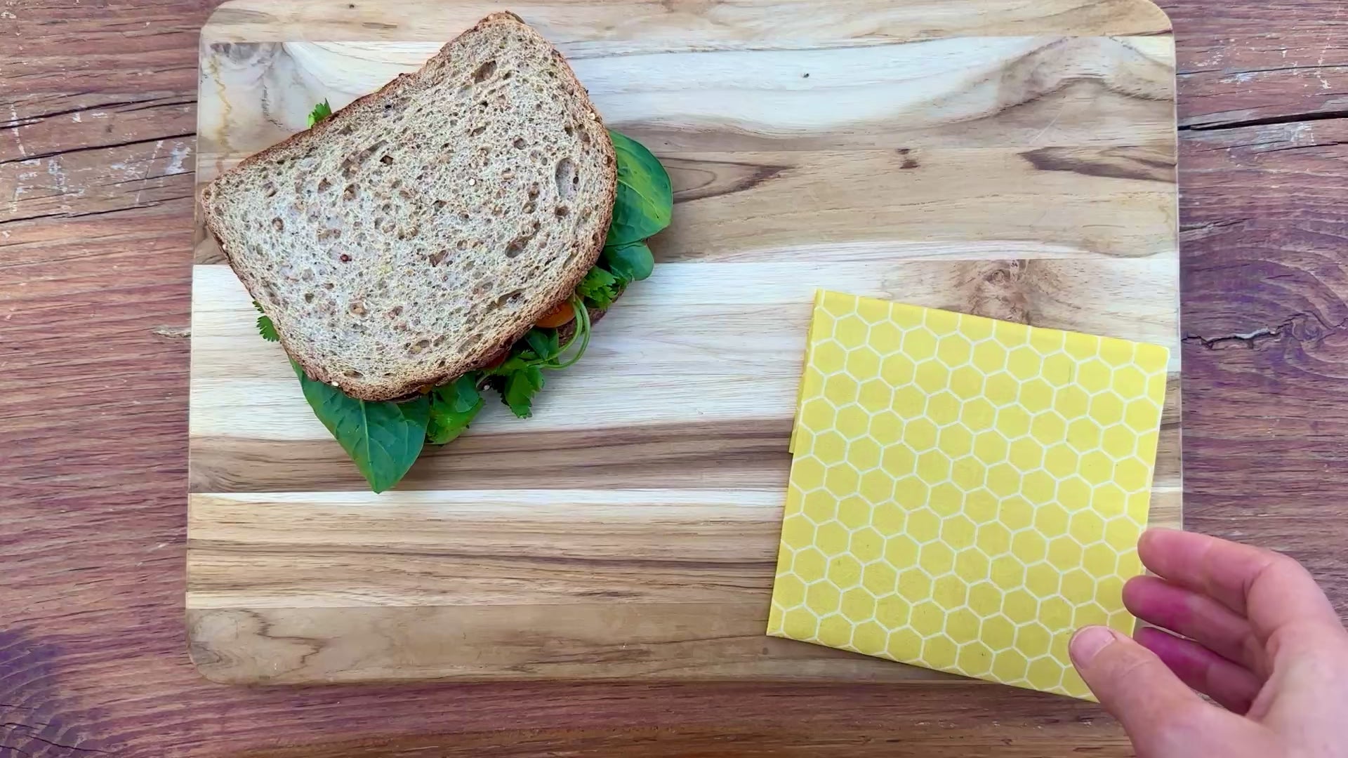 Load video: Wrapping my sandwich in honeycomb Beeswax wrap